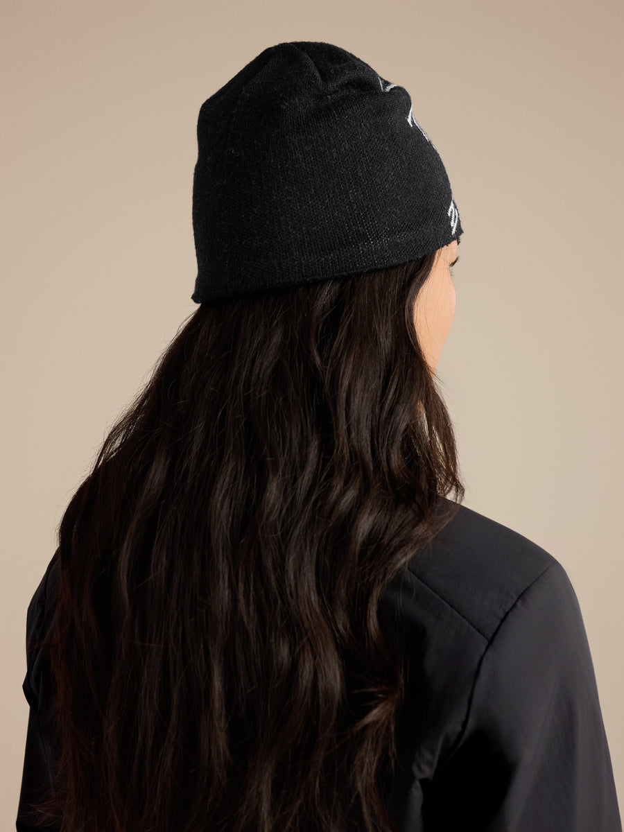 Bird Head Toque in Orca, showing its shape when worn
