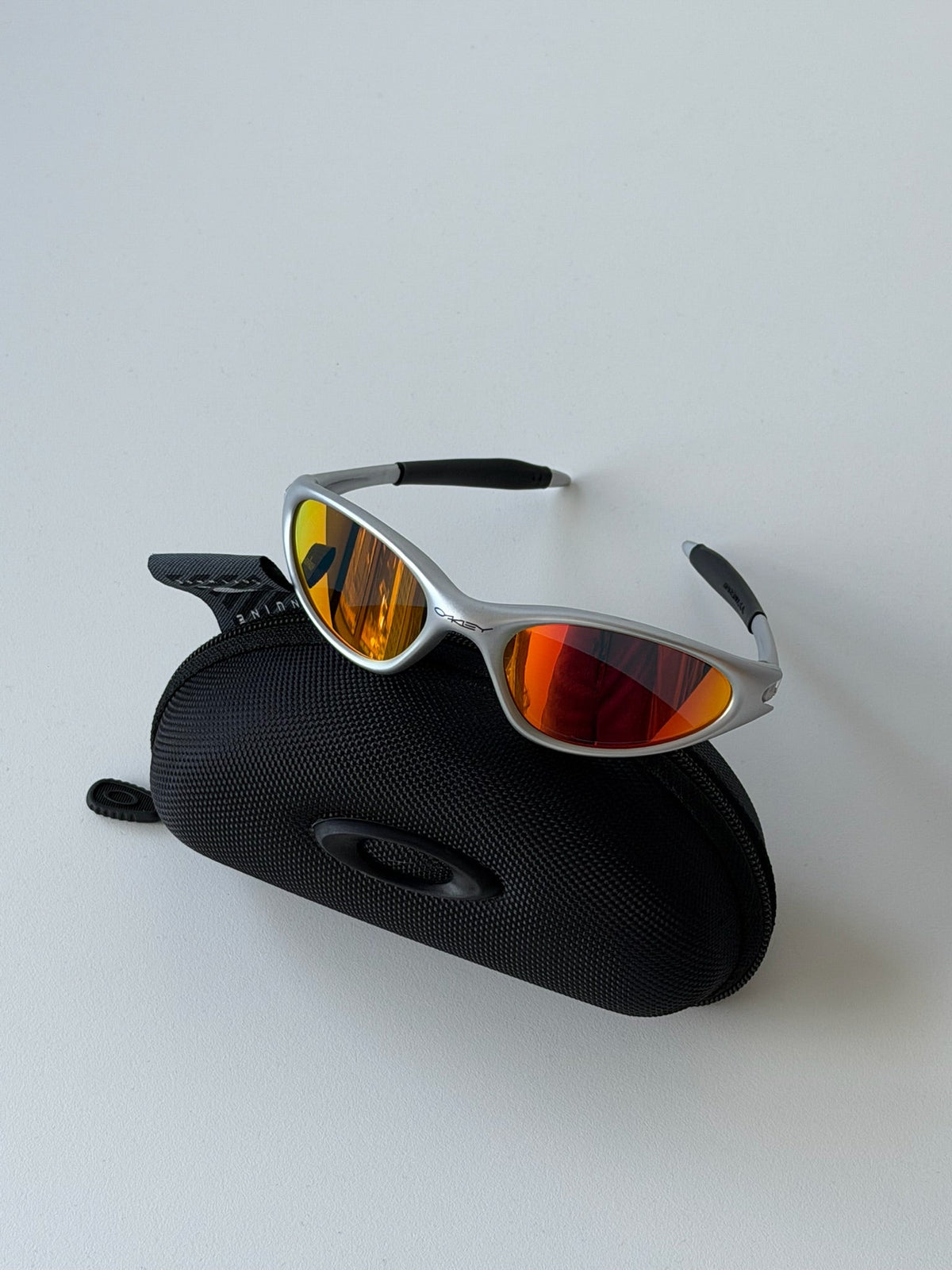 Oakley Eye Jacket Minute 1.0 Sunglasses – Silver / Fire Red — original product photo 1